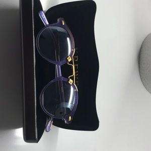 Blue St. Louis style glasses. Reflective lens, trimmed in gold, case included.